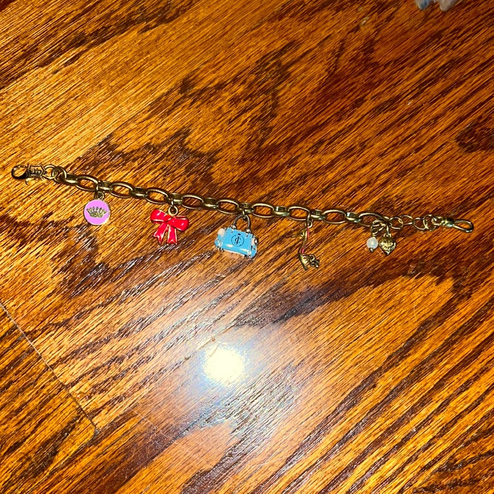 Beautiful gold charmed juicy couture girl bracelet